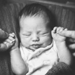 baby holding hands